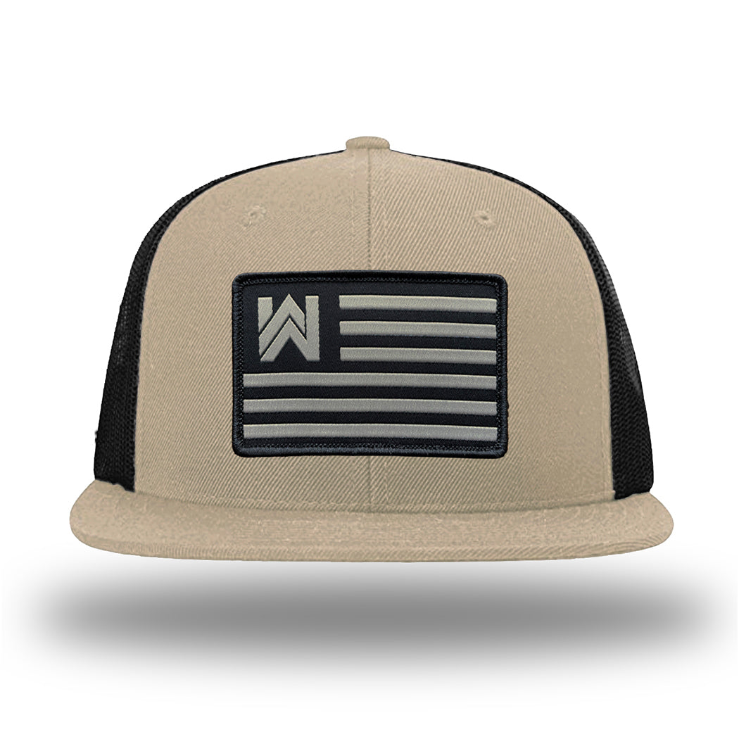 Khaki/Black WeWorkin hat—Richardson 511 brand snapback, flatbill trucker hat style. WE WORKIN FLAG woven patch with black merrowed edge is centered on the front panels.