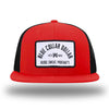 Red/Black WeWorkin hat—Richardson 511 brand snapback, flatbill trucker hat style. BLUE COLLAR DOLLAR ARCH (BCD-ARCH) woven patch with black merrowed edge, on a white background with black text, is centered on the front panels.