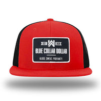 Red/Black WeWorkin hat—Richardson 511 brand snapback, flatbill trucker hat style. WeWorkin "Blue Collar Dollar" rectangle patch is centered large on the front panels. 