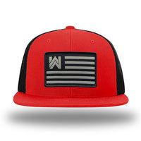 Red/Black WeWorkin hat—Richardson 511 brand snapback, flatbill trucker hat style. WE WORKIN FLAG woven patch with black merrowed edge is centered on the front panels.