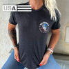 Woman wearing a WW black tee MADE IN THE USA, shown from front. "WE WORKIN—SALUTE TO FREEDOM" text circling around a President Trump "freedom concepi" image in center. Graphic is printed small on left chest "pocket" area. Printed in full color/patriotic inks.