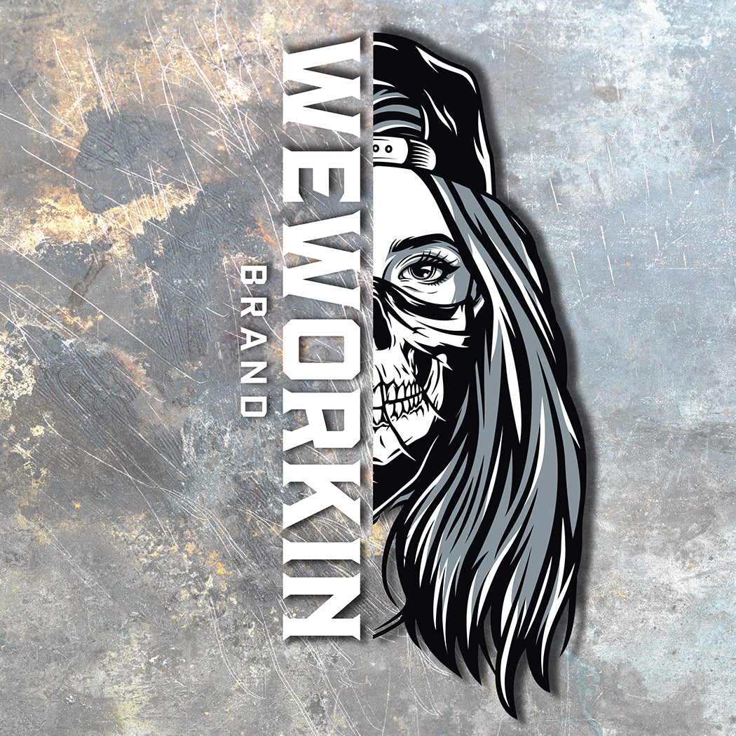 WEWORKIN BRAND black and white Women's SKULL Decal—Custom die-cut Direct Transfer window sticker on scratched metal background.