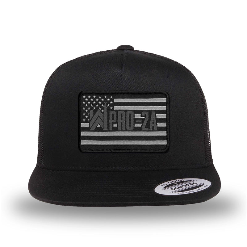 All black, high-profile, WeWorkin hat—snapback, 5-panel classic trucker, mesh sides/back style. We Workin PRO-2A woven patch with black merrowed edge is centered on the front panel.