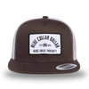 Brown/White two-tone WeWorkin hat—flatbill, snapback, 5-panel classic trucker, mesh-back style. BLUE COLLAR DOLLAR ARCH (BCD-ARCH) woven patch with black merrowed edge, on a white background with black text, is centered on the front panel.