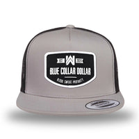 Silver/Black two-tone WeWorkin hat—snapback, 5-panel classic trucker, mesh sides/back style. WeWorkin "Blue Collar Dollar" curved-bottom woven patch is centered on the front panel.
