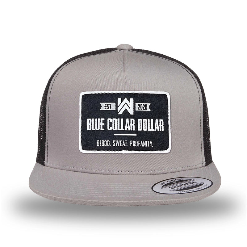Silver/Black two-tone WeWorkin hat—snapback, 5-panel classic trucker, mesh sides/back style. WeWorkin "Blue Collar Dollar" rectangular woven patch is centered on the front panel.