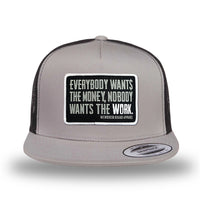 Silver/Black two-tone WeWorkin hat—snapback, 5-panel classic trucker, mesh sides/back style. WeWorkin "Everybody Want$ the Money, Nobody Wants the WORK." rectangular woven patch is centered on the front panel.