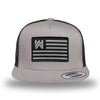 Silver/Black two-tone WeWorkin hat—snapback, 5-panel classic trucker, mesh sides/back style. We Workin Flag rectangular patch is centered on the front panel.