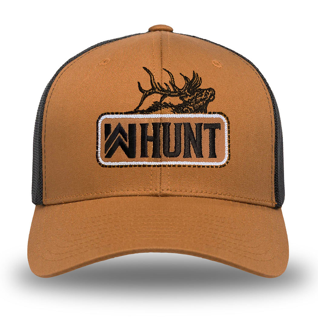 Picture of our WW HUNT trucker hat in duotone Caramel and black, on white background. Embroidered with WW HUNT and ELK in our signature "patch" style across the front (WW icon/text/elk graphic in black thread, outer outline in black thread, inner "rope" in white thread). Front 2 panels and bill are caramel color, side/back mesh panels are black.
