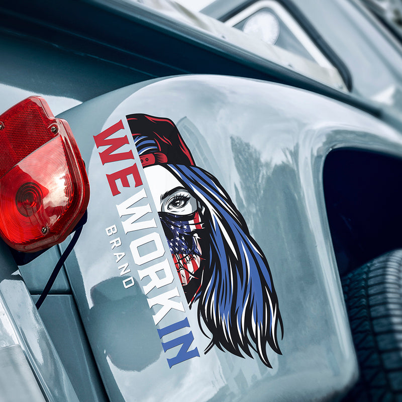 WEWORKIN BRAND red, white and blue Women's Skull decal. Custom die-cut, Direct Transfer window sticker on fender of a vintage truck.