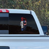 Cropped in image of a LARGE size WEWORKIN BRAND Patriotic Skull 11"H—Custom die-cut Direct Transfer window sticker in multi-color, on rear window (Right side, centered) of a Chevy truck. Foliage in background.