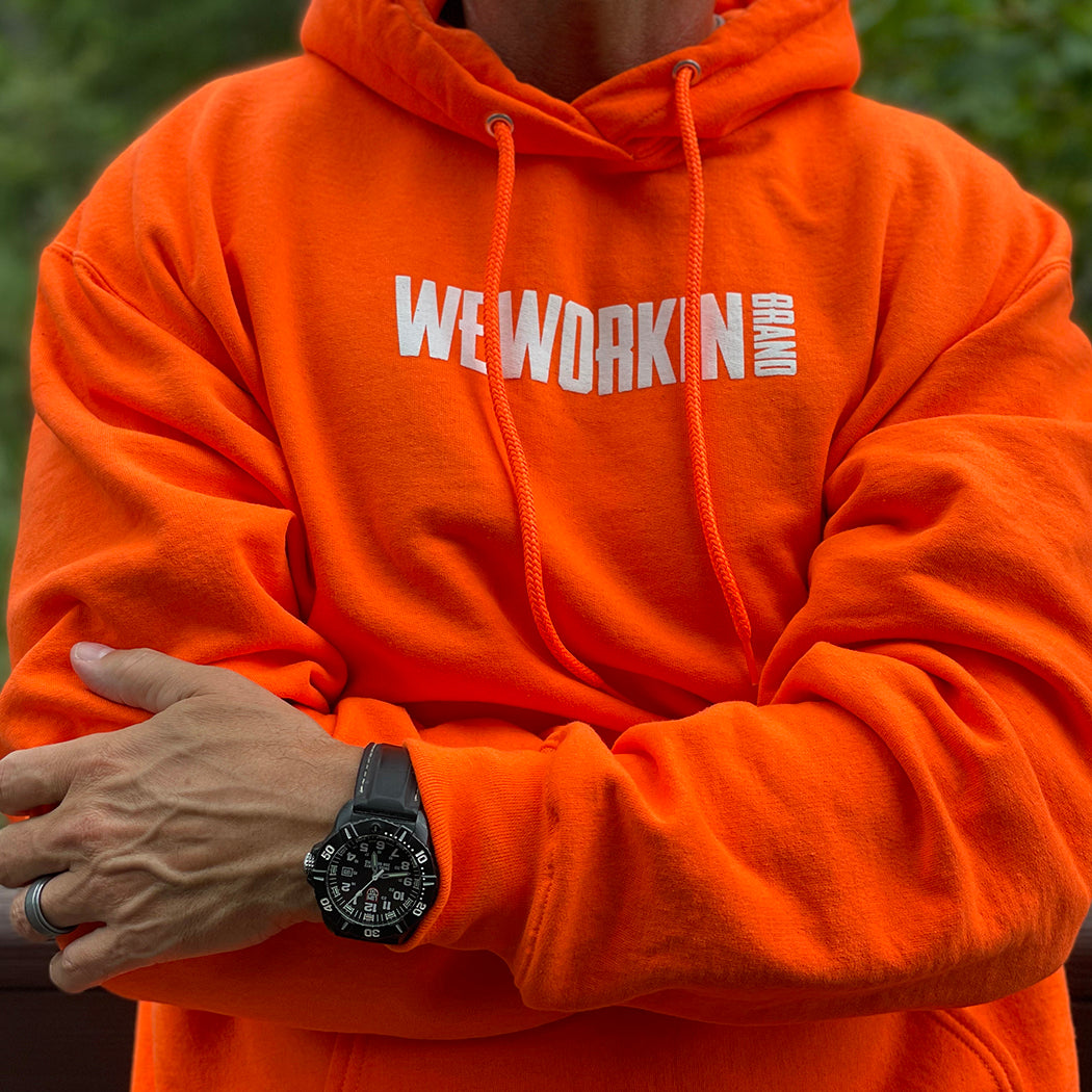 Orange sweatshirt with outlet black writing