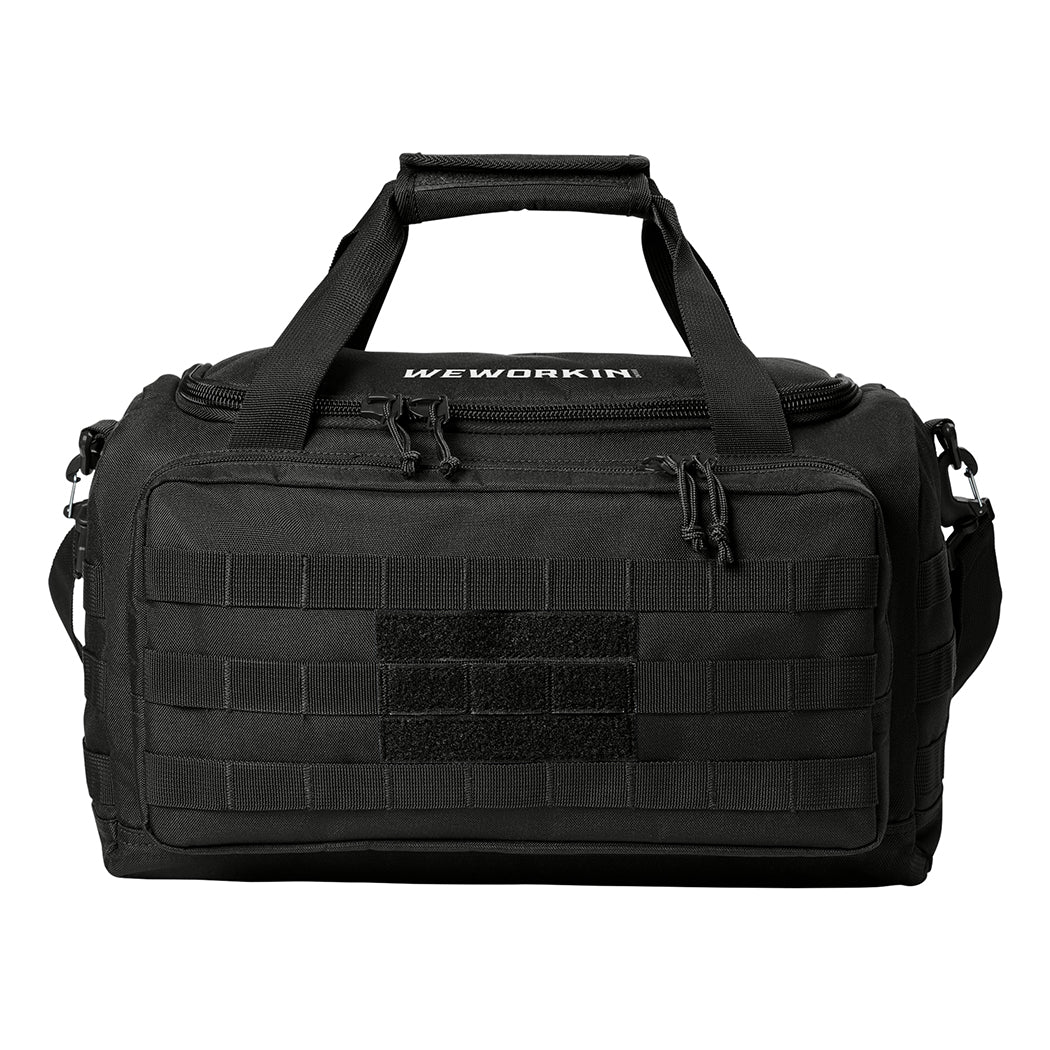 Stealth Black tactical range/gear bag pictured from front on a white background. WEWORKIN BRAND logo embroidered in white thread on the top panel. 600D polyester canvas, Zippered D-shaped main compartment, Padded wrap on web carry handles, Daisy chains on sides, Front zippered pocket with daisy chain/loop panel for patches.