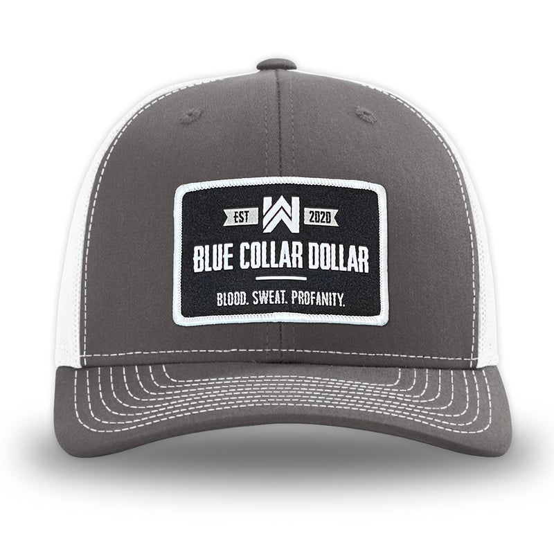 Charcoal/White WeWorkin hat—Richardson 112 brand snapback, retro trucker classic hat style. WeWorkin "Blue Collar Dollar" patch is centered large on the front panels.