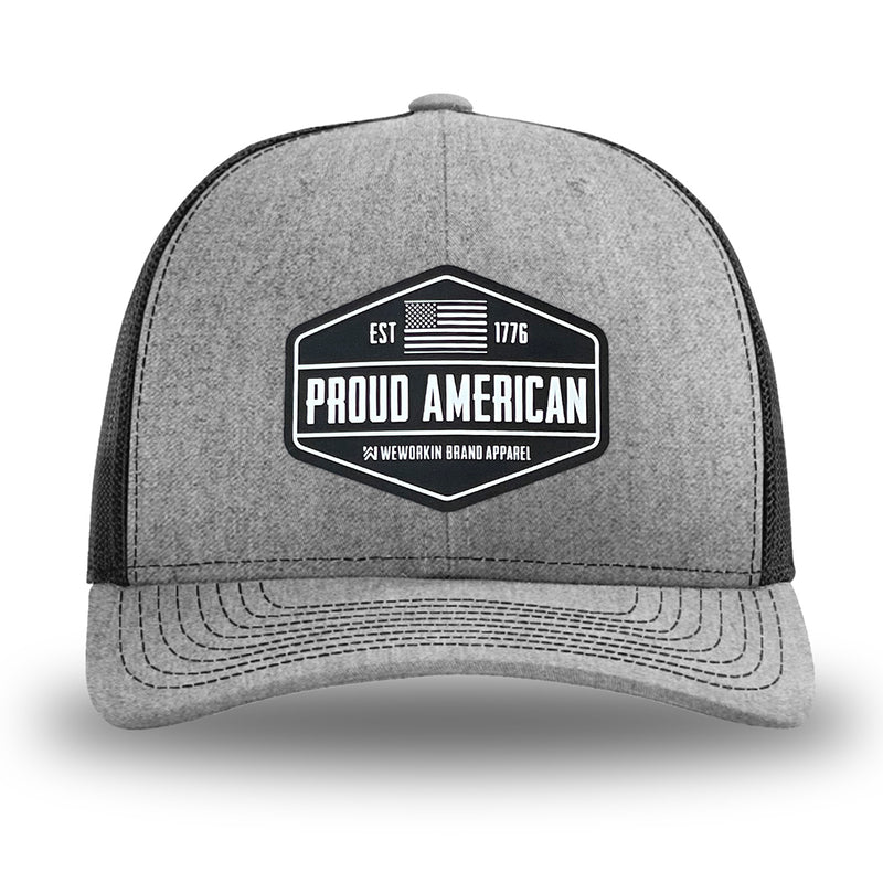 Heather Grey/Black WeWorkin hat—Richardson 112 brand snapback, retro trucker classic hat style. WeWorkin black and white "PROUD AMERICAN" silicone patch is centered on the front panels.