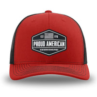 Red/Black WeWorkin hat—Richardson 112 brand snapback, retro trucker classic hat style. WeWorkin black and white "PROUD AMERICAN" silicone patch is centered on the front panels.