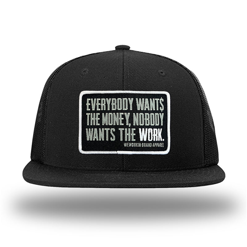 Solid Black WeWorkin hat—Richardson 511 brand snapback, flatbill trucker hat style. WeWorkin "Everybody Want$ the Money..." patch is centered large on the front panels.