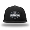 Solid Black WeWorkin hat—Richardson 511 brand snapback, flatbill trucker hat style. WeWorkin black and white "PROUD AMERICAN" silicone patch is centered on the front panels.